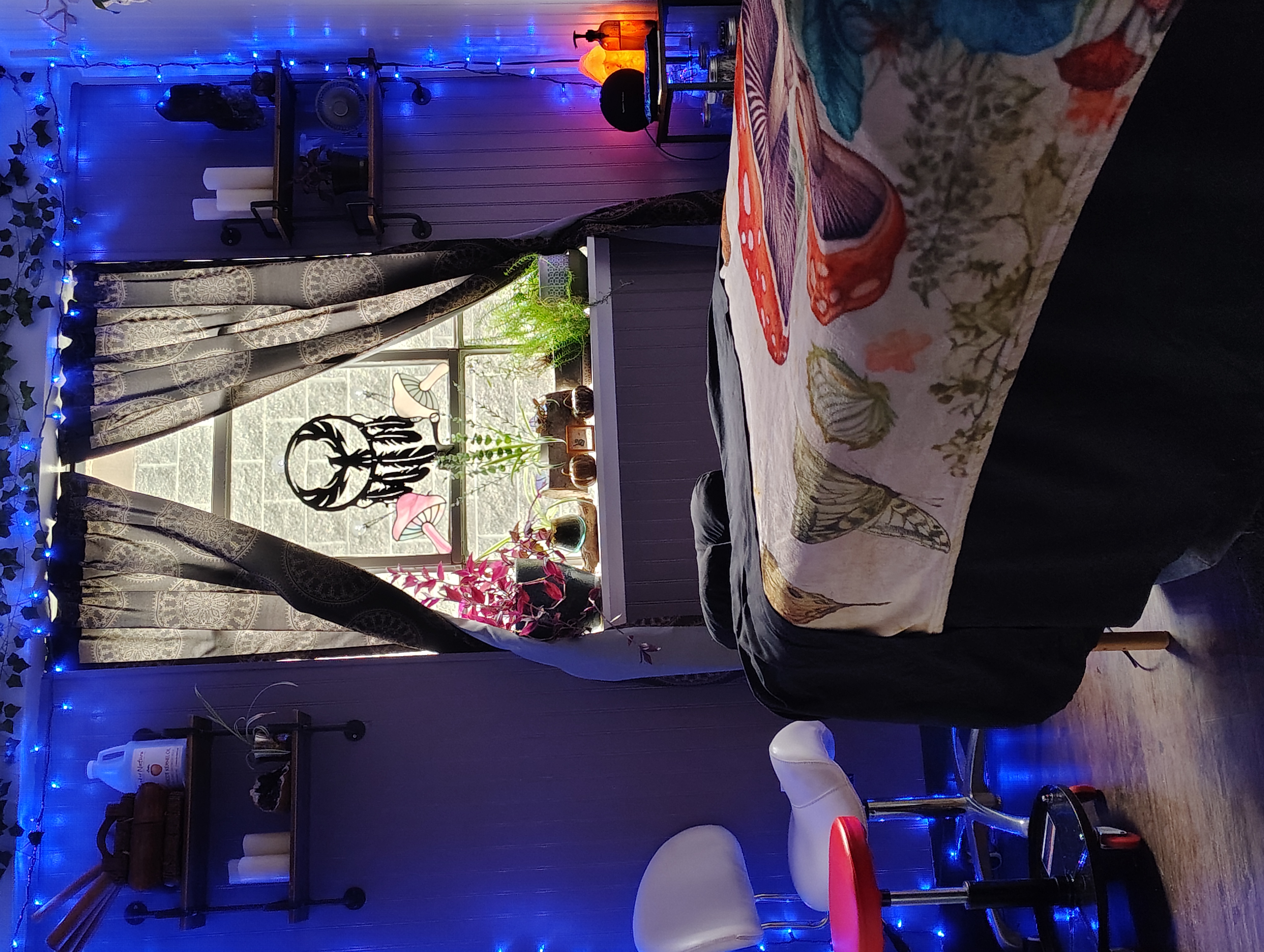 Massage table and softly lit treatment room